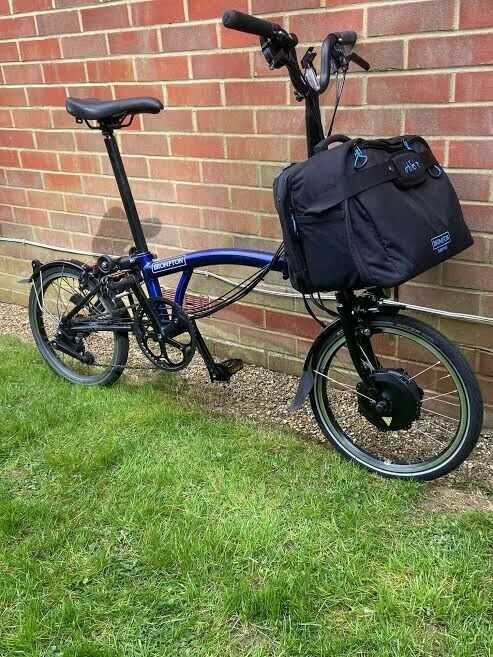 Brompton M6L electric folding bike, Bolt blue with extras, in pristine condition